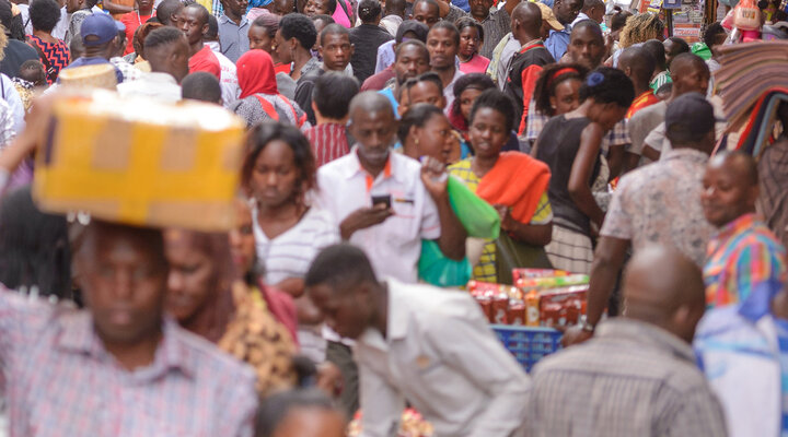 KAMPALA, UGANDA - APRIL 17TH 2018. People go about their everyday business in Kikuubo, one of Kampala's busiest trading areas.